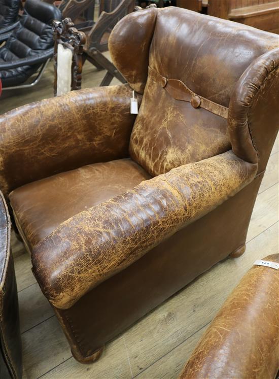 A large 1940s French leather club armchair